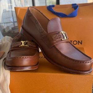 Louis Vuitton Brown Leather Major Loafers with Gold Detail.